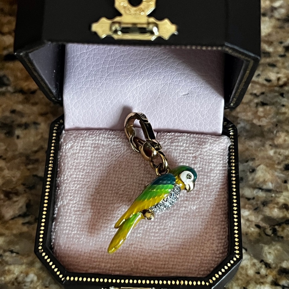 Juicy Couture parrot charm with movable wings. Never worn